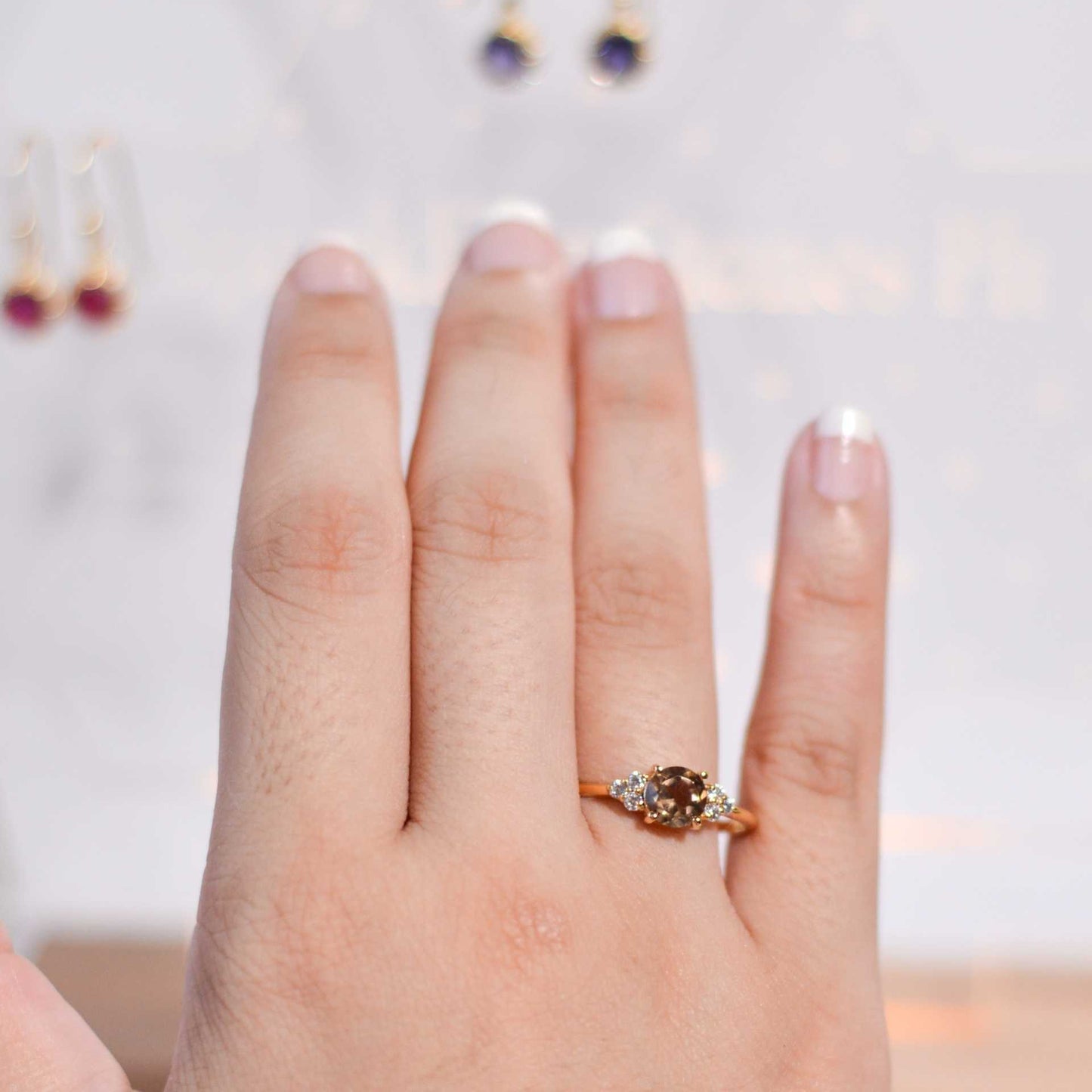 6 mm Round cut Smokey Topaz with 3 Cz side stones Ring