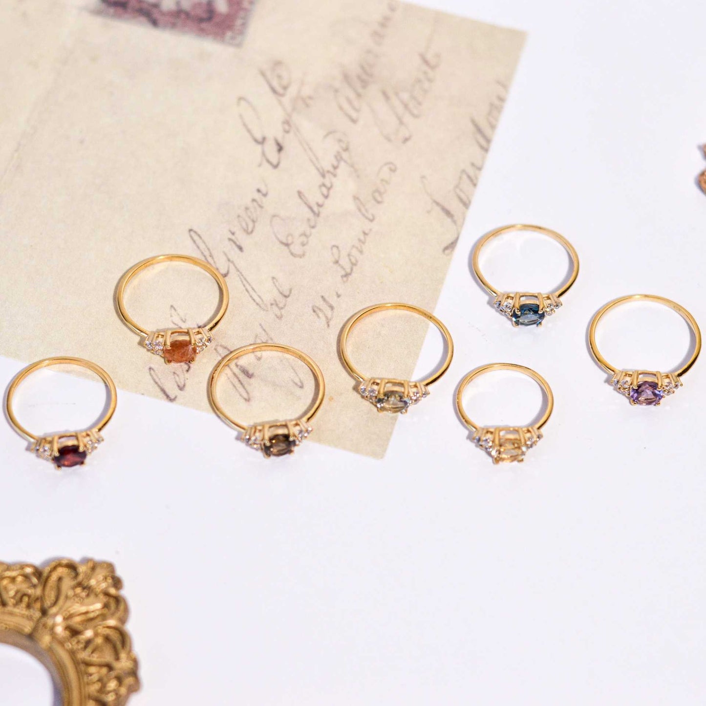 6 mm Round cut Smokey Topaz with 3 Cz side stones Ring
