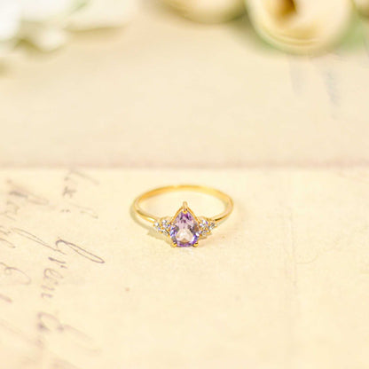 8 x 6 mm Pear cut Pink Amethyst with 3 Cz side stones Ring