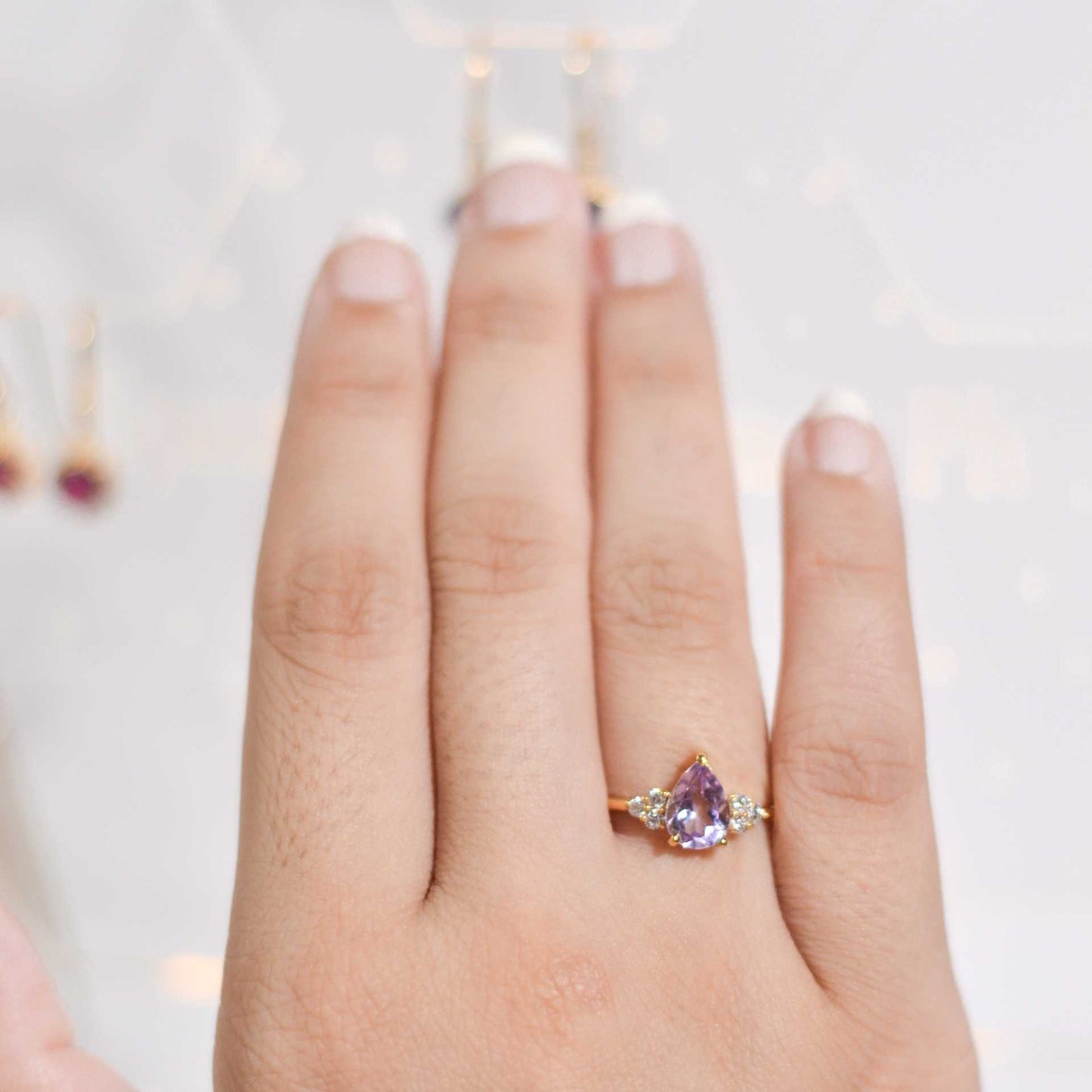 8 x 6 mm Pear cut Pink Amethyst with 3 Cz side stones Ring