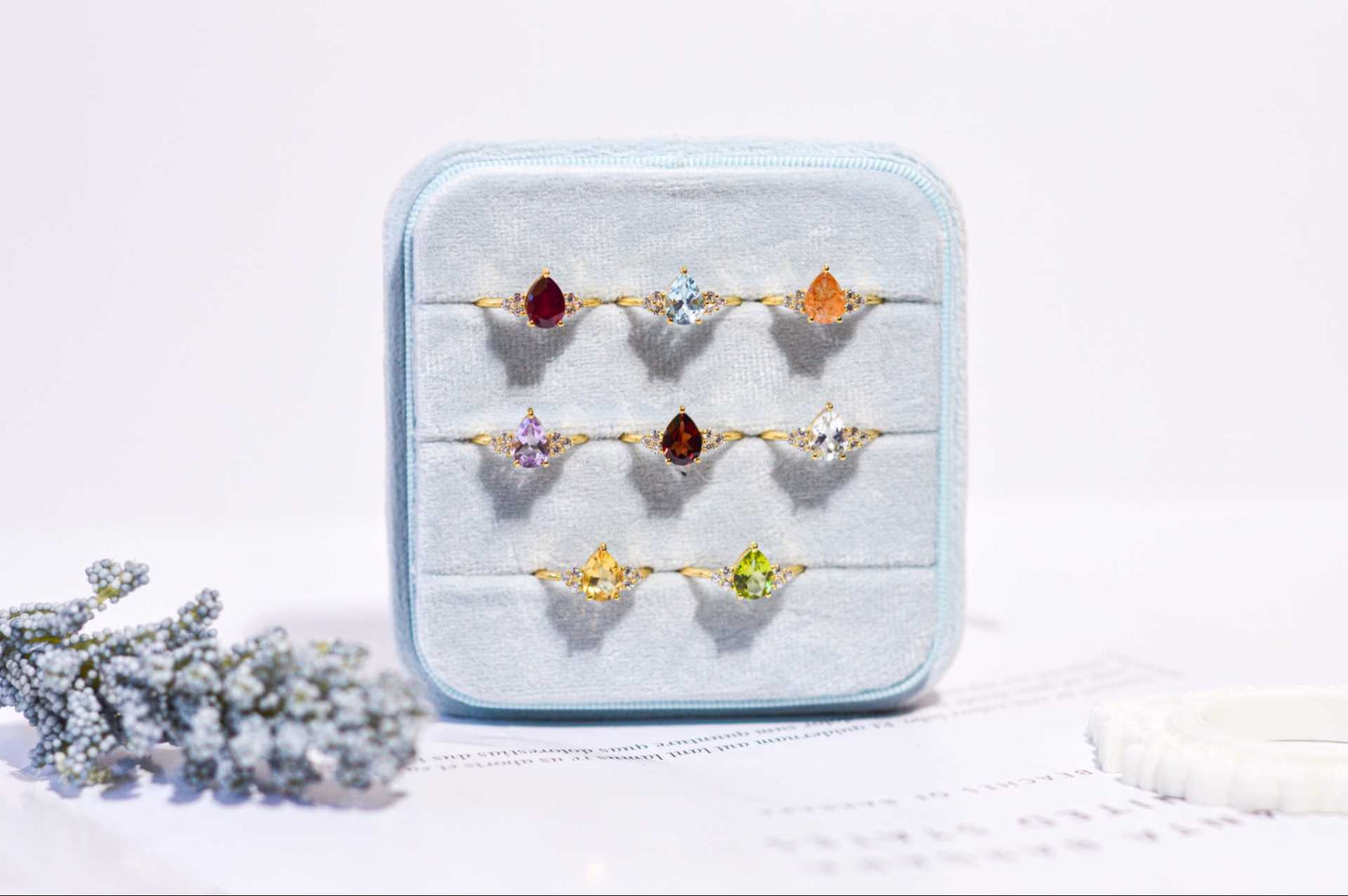 8 x 6 mm Pear cut White Topaz with 3 Cz side stones Ring