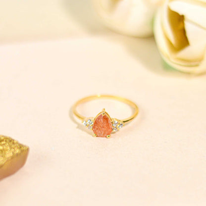 8 x 6 mm Pear cut Sunstone with 3 Cz side stones Ring