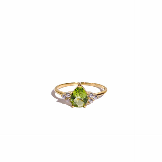 8 x 6 mm Pear cut Peridot with 3 Cz side stones Ring