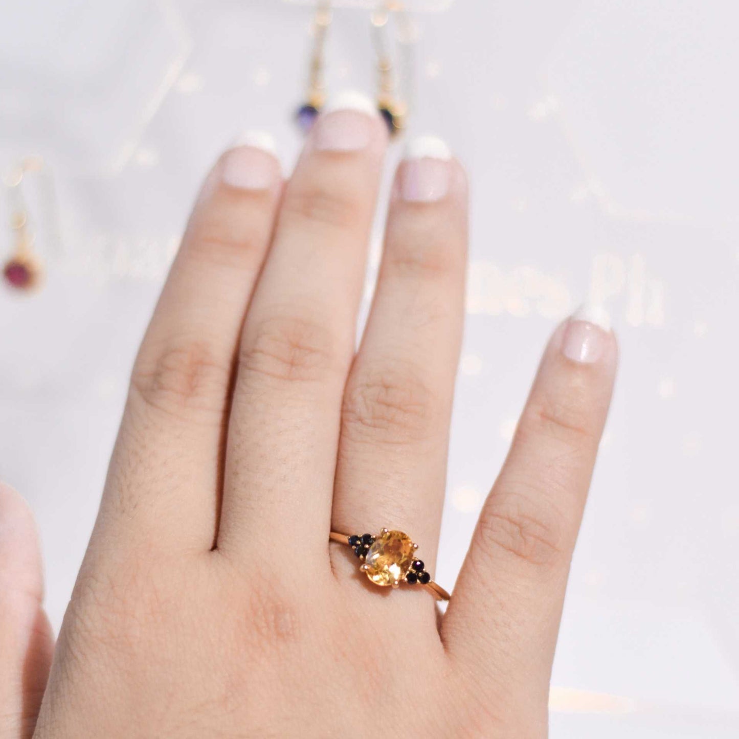8 x 6 mm Oval cut Citrine with 3 Black Spinel side stones Ring