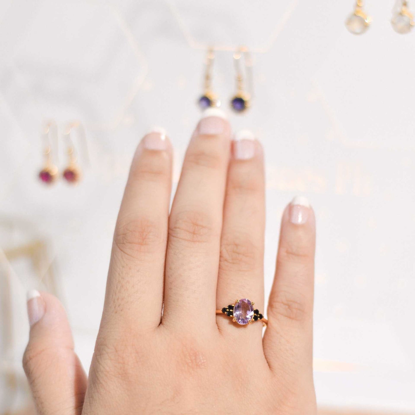 8 x 6 mm Oval cut Pink Amethyst with 3 Black Spinel side stones Ring