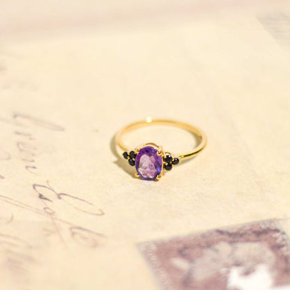 8 x 6 mm Oval cut Purple Amethyst with 3 Black Spinel side stones Ring