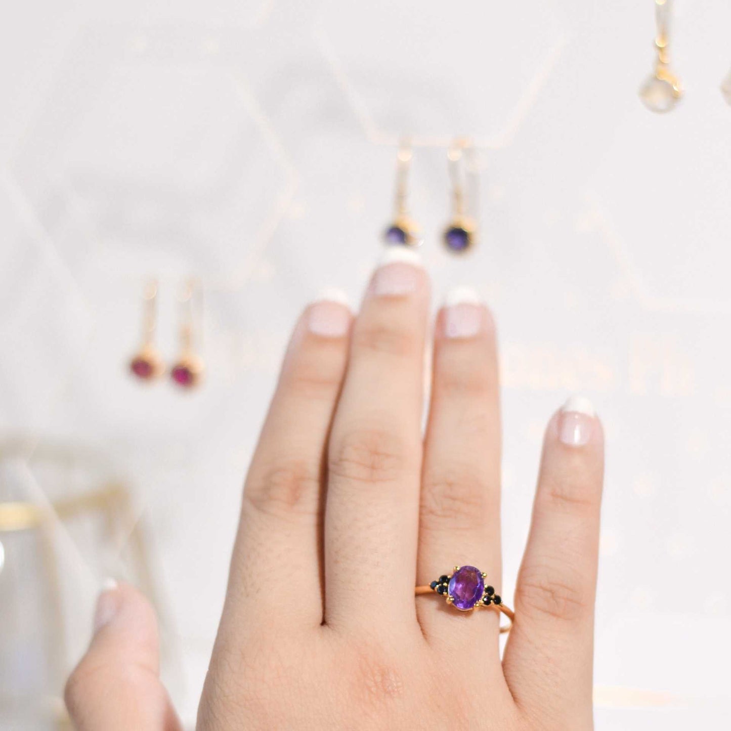 8 x 6 mm Oval cut Purple Amethyst with 3 Black Spinel side stones Ring