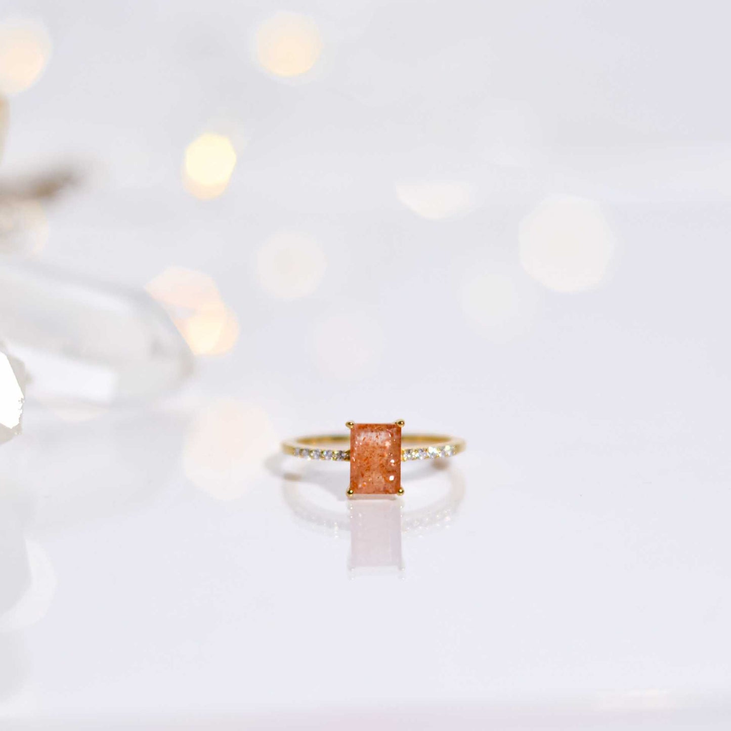 7 x 5 mm Baguette cut Sunstone with Cz band Ring