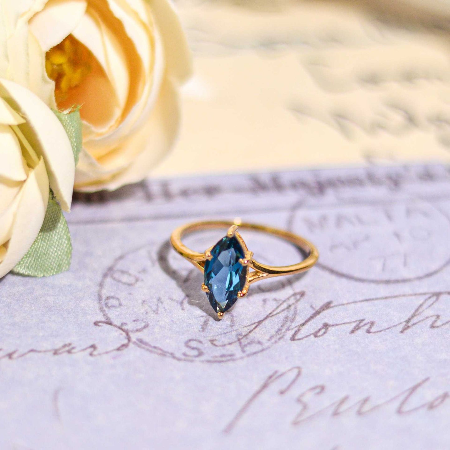 12 x 6 mm Marquise cut London Blue Topaz Yellow gold plated Ring