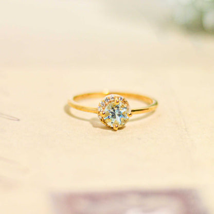 6 mm Round cut Swiss Blue Topaz with Crescent Cz Yellow gold plated Ring