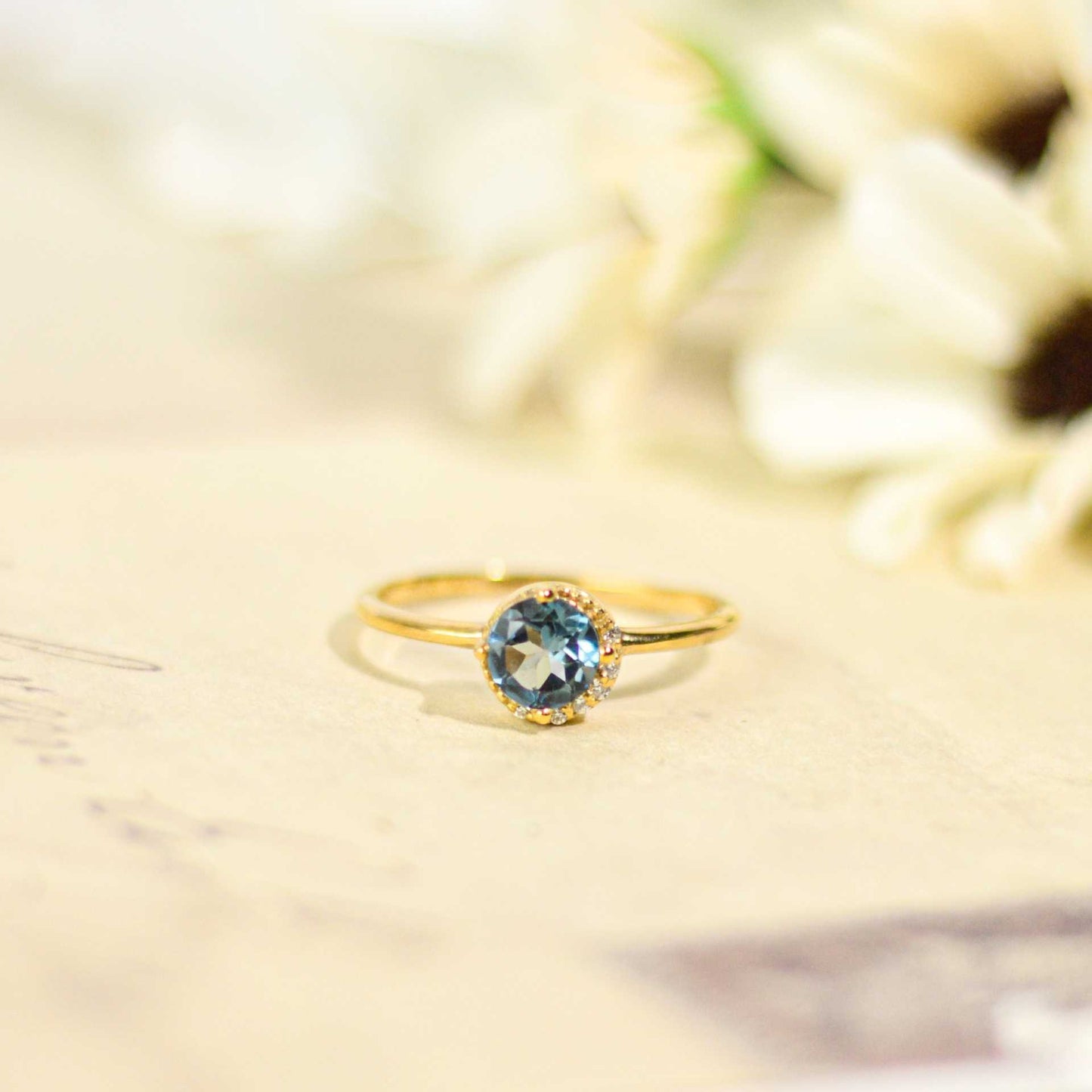 6 mm Round cut London Blue Topaz with Crescent Cz Yellow gold plated Ring