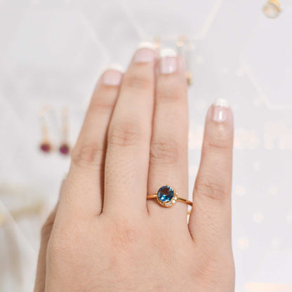 6 mm Round cut London Blue Topaz with Crescent Cz Yellow gold plated Ring