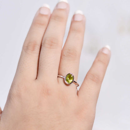 8 x 6 mm Oval cut Peridot Bezel Ring