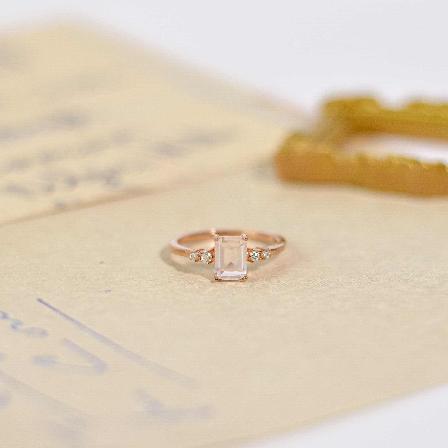 7 x 5 mm Baguette cut Rose Quartz with 2 side stones Ring