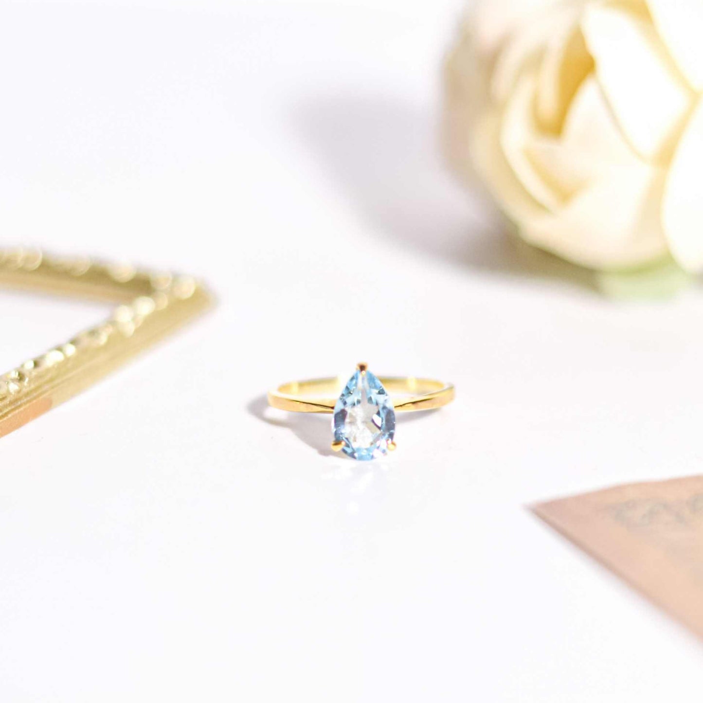 8 x 6 mm Pear cut Blue Topaz Ring