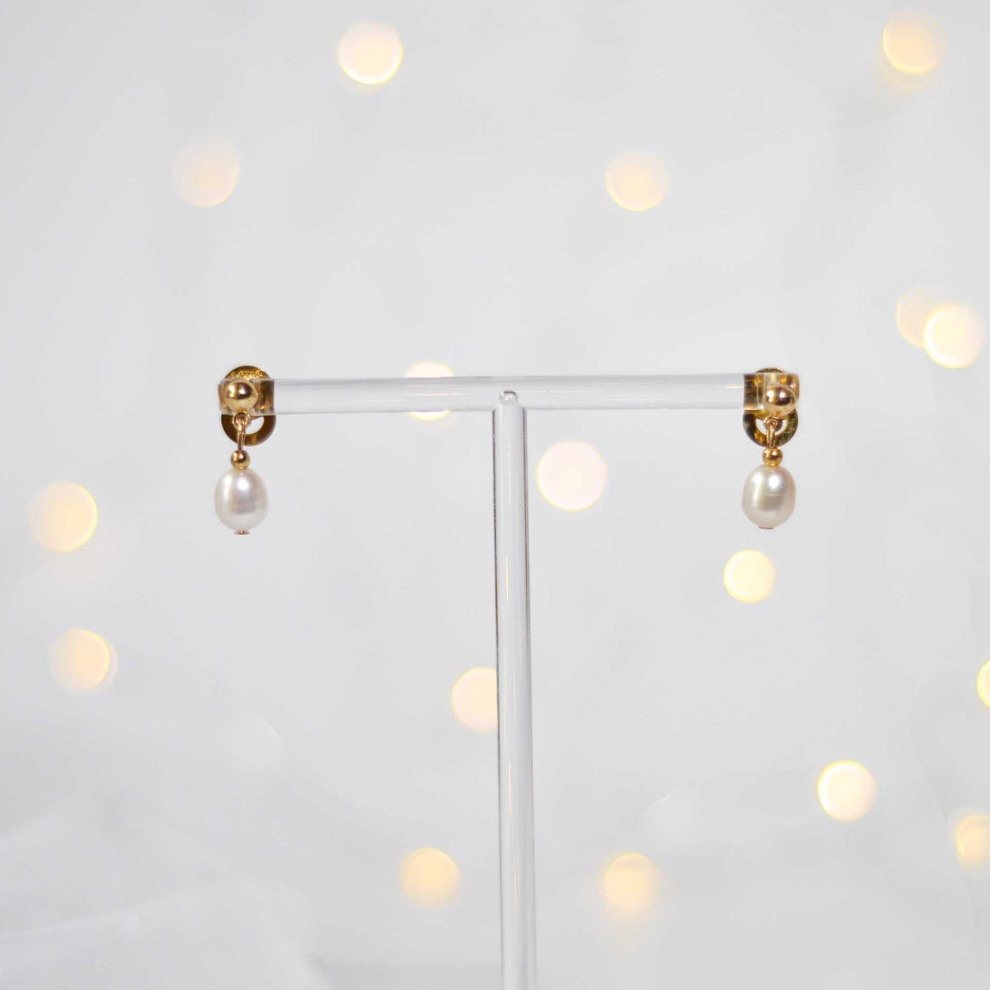 White biwa dangling pearls yellow gold plated earrings