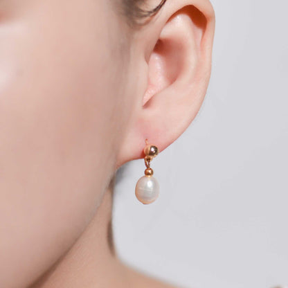 White biwa dangling pearls yellow gold plated earrings