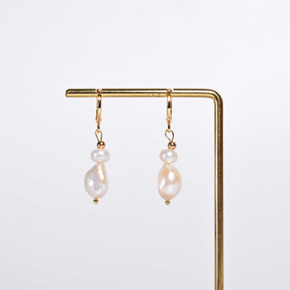 White siopao and baroque dangling pearls yellow gold plated earrings