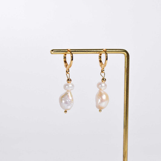 White siopao and baroque dangling pearls yellow gold plated earrings